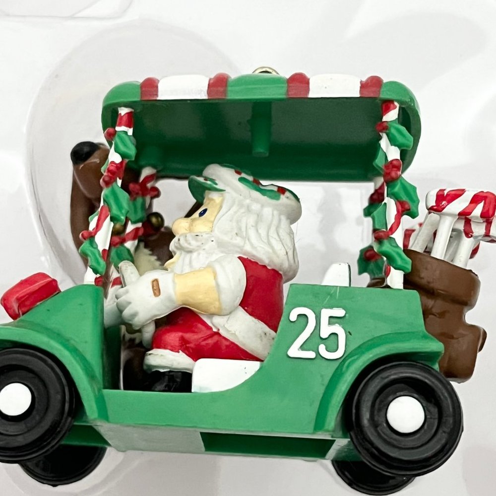 ORNAMOTION ROTATING CHRISTMAS ORNAMENT, SANTA IN GOLF CART,  NOMA VINTAGE 1989